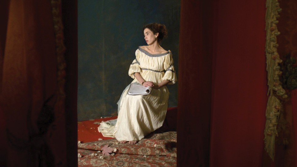 A painterly image of a woman in a 19th century tunic sitting with a script on her lapalr