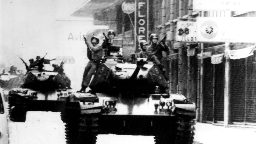 military tanks driving down the streetalr