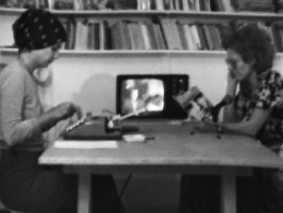 black and white screen shot Carole Roussopoulos on left and Delphine Seyrig on right, reading SCUM Manifesto