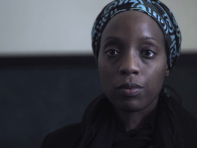 close-up of an African woman looking concerned in an office